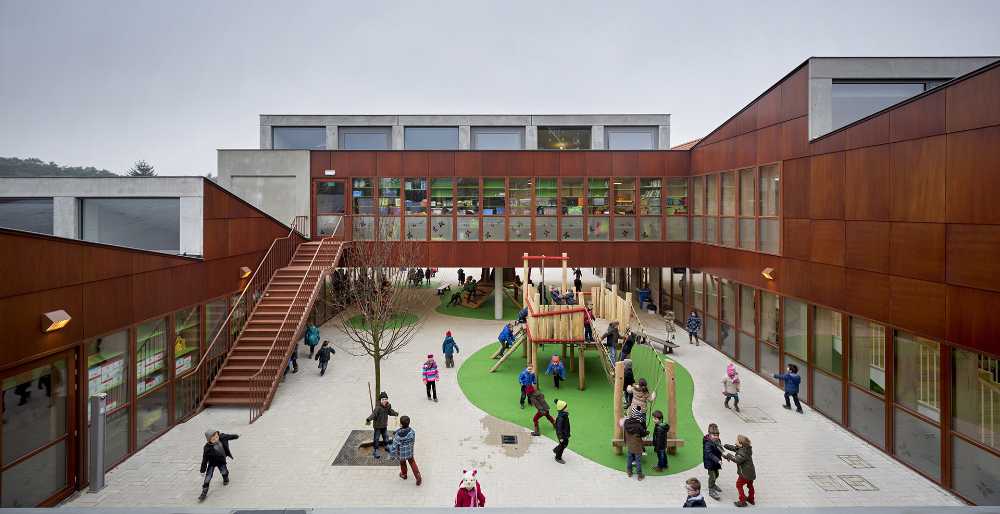 Courtyard of a kindergarten with wooden panels